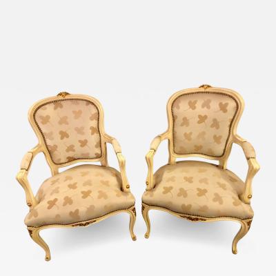 Pair of French Louis XV Style Parcel Gilt and Paint Decorated Bergere Chairs