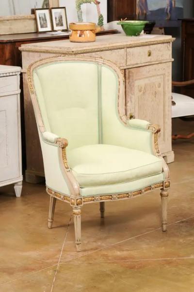 Pair of French Louis XVI Style 1900s Painted and Parcel Gilt Berg res Chairs