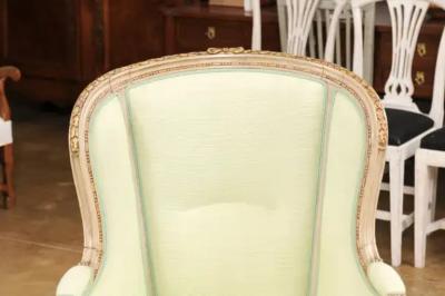 Pair of French Louis XVI Style 1900s Painted and Parcel Gilt Berg res Chairs