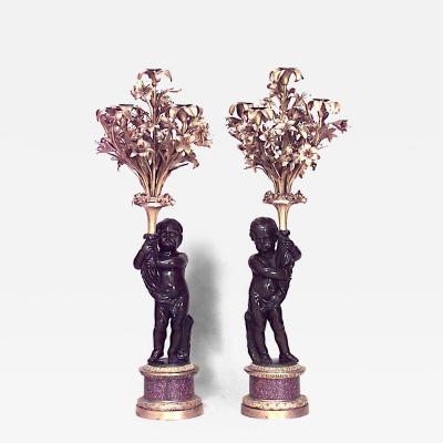 Pair of French Louis XVI Style Bronze Cupid Candelabras