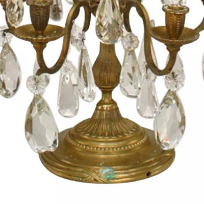 Pair of French Louis XVI Style Bronze and Crystal Candelabras