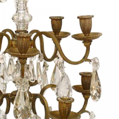 Pair of French Louis XVI Style Bronze and Crystal Candelabras
