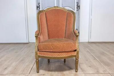 Pair of French Louis XVI Style Gilded Wood Berg res Chairs with Carved D cor