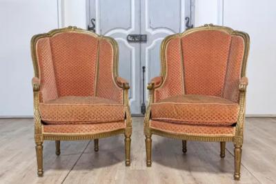Pair of French Louis XVI Style Gilded Wood Berg res Chairs with Carved D cor