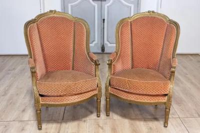 Pair of French Louis XVI Style Gilded Wood Berg res Chairs with Carved D cor