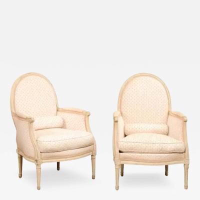 Pair of French Louis XVI Style Painted Berg res Chairs with Oval Shaped Backs