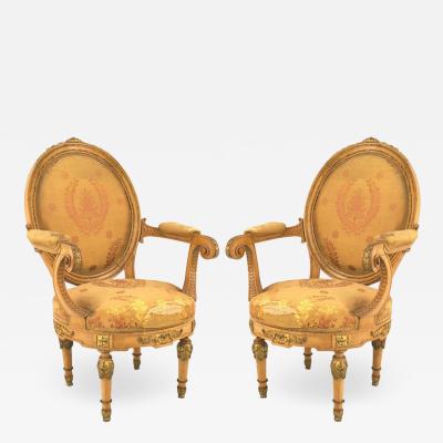Pair of French Louis XVI Yellow Silk Arm Chairs