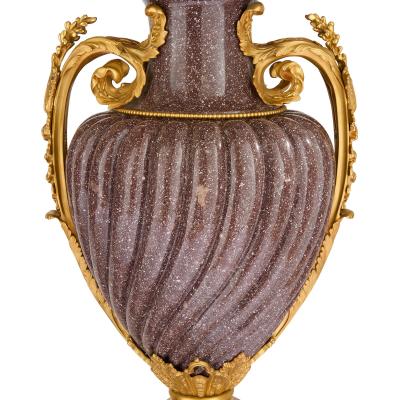 Pair of French Neoclassical style ormolu mounted porphyry vases
