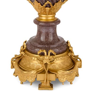 Pair of French Neoclassical style ormolu mounted porphyry vases