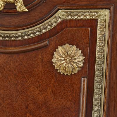 Pair of French Neoclassical style parcel gilt mahogany pedestals