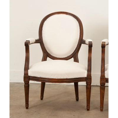 Pair of French Oak Louis XVI Style Fauteuils