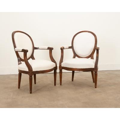Pair of French Oak Louis XVI Style Fauteuils