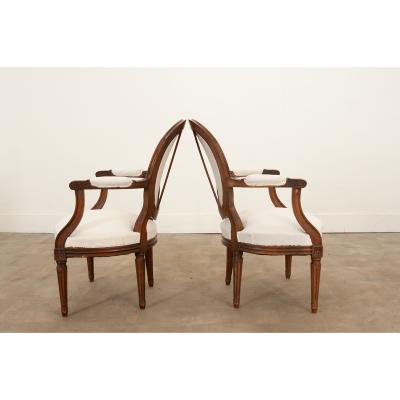 Pair of French Oak Louis XVI Style Fauteuils