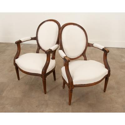 Pair of French Oak Louis XVI Style Fauteuils