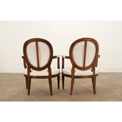 Pair of French Oak Louis XVI Style Fauteuils