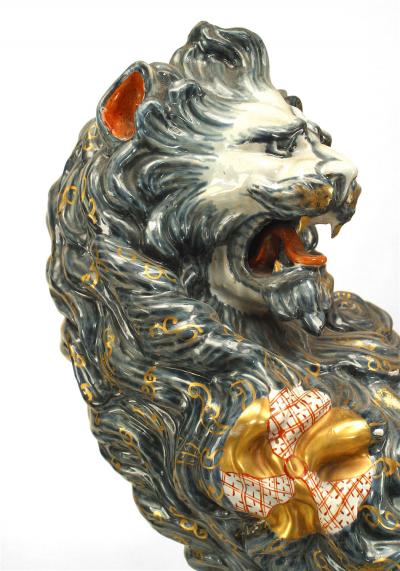 Pair of French Porcelain Lions Holding Wrought Iron Candelabras