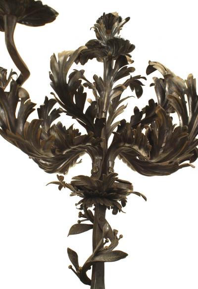 Pair of French Porcelain Lions Holding Wrought Iron Candelabras