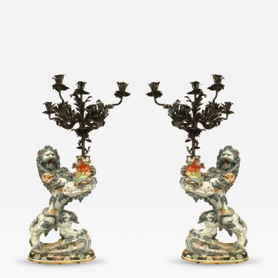 Pair of French Porcelain Lions Holding Wrought Iron Candelabras