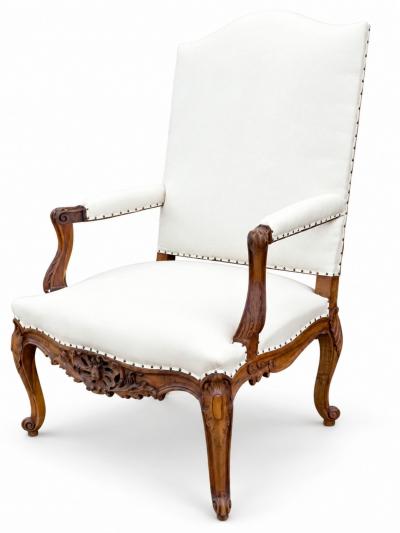 Pair of French Regence Style Armchairs in carved Walnut 19th Century
