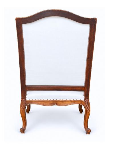 Pair of French Regence Style Armchairs in carved Walnut 19th Century