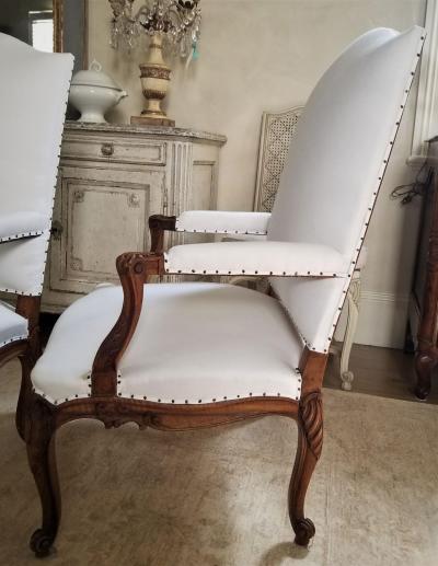Pair of French Regence Style Armchairs in carved Walnut 19th Century