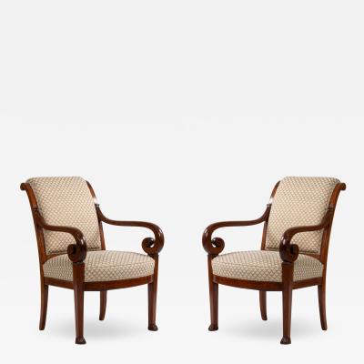 Pair of French Restoration Mahogany Arm Chairs