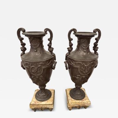 Pair of French Victorian metal urns