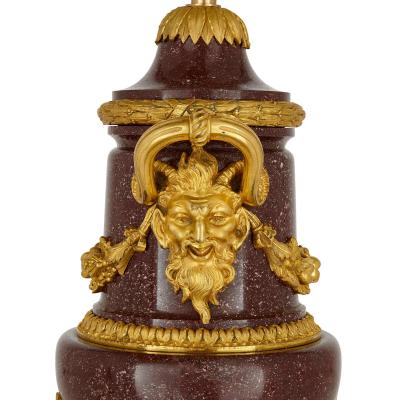 Pair of French antique gilt bronze and porphyry lamps