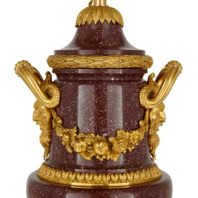 Pair of French antique gilt bronze and porphyry lamps
