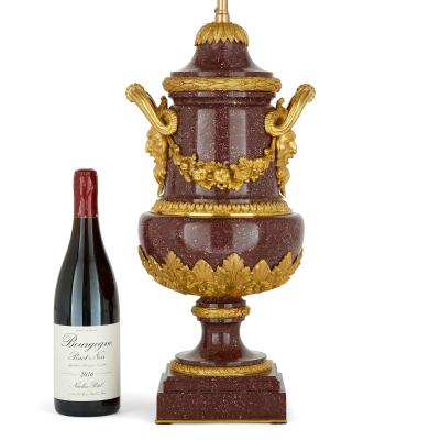 Pair of French antique gilt bronze and porphyry lamps