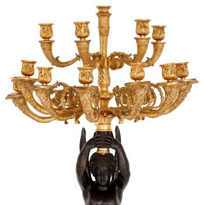 Pair of French gilt and patinated bronze wall lights