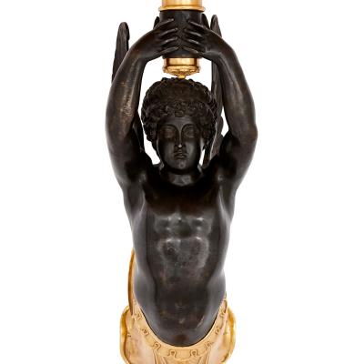 Pair of French gilt and patinated bronze wall lights