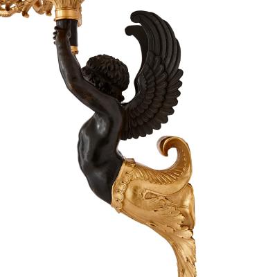 Pair of French gilt and patinated bronze wall lights