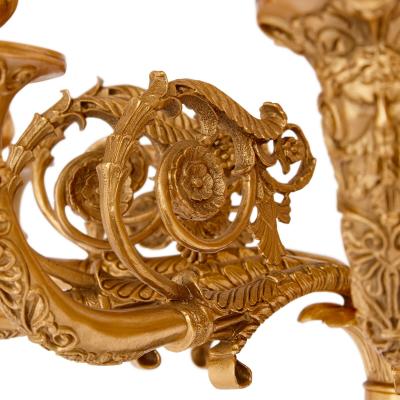 Pair of French gilt and patinated bronze wall lights