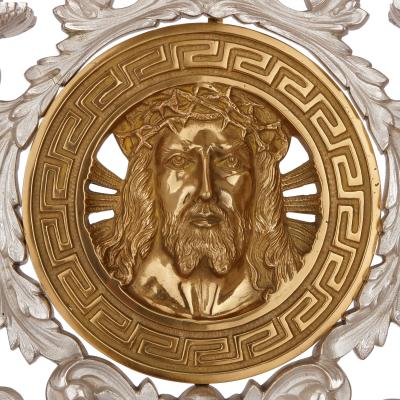 Pair of French gilt and silvered bronze candelabra depicting Jesus and Madonna