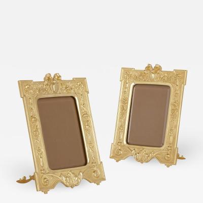 Pair of French gilt bronze photograph frames in the Neoclassical style