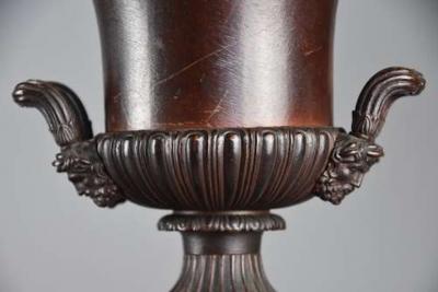Pair of French late 19thc spelter campana urns on plinth bases