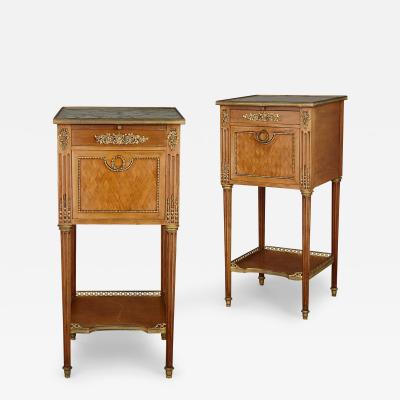Pair of French mahogany and ormolu bedside cabinets