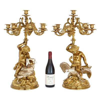 Pair of French silvered and gilt bronze candelabra