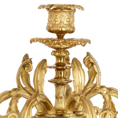 Pair of French silvered and gilt bronze candelabra