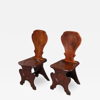 Pair of George III Mahogany Hall Chairs