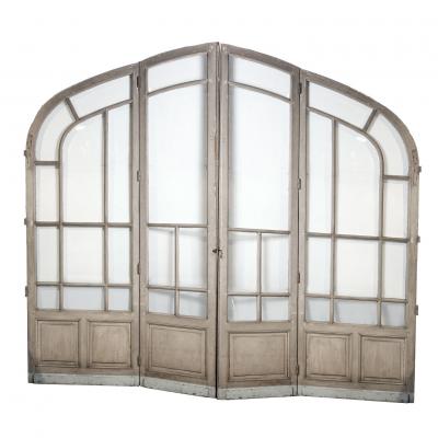 Pair of Grand Scale Arched Glass Paneled Double Doors