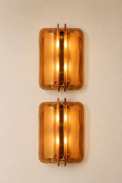 Pair of Hand casted Murano Glass and Brass Wall Sconces in Cognac Italy