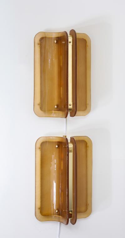 Pair of Hand casted Murano Glass and Brass Wall Sconces in Cognac Italy