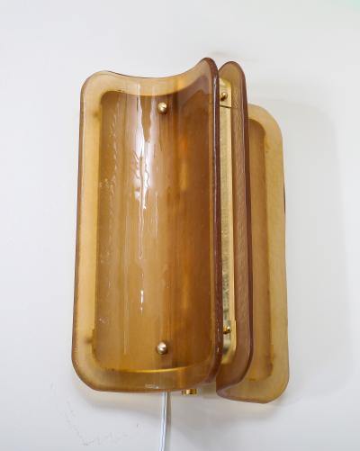 Pair of Hand casted Murano Glass and Brass Wall Sconces in Cognac Italy