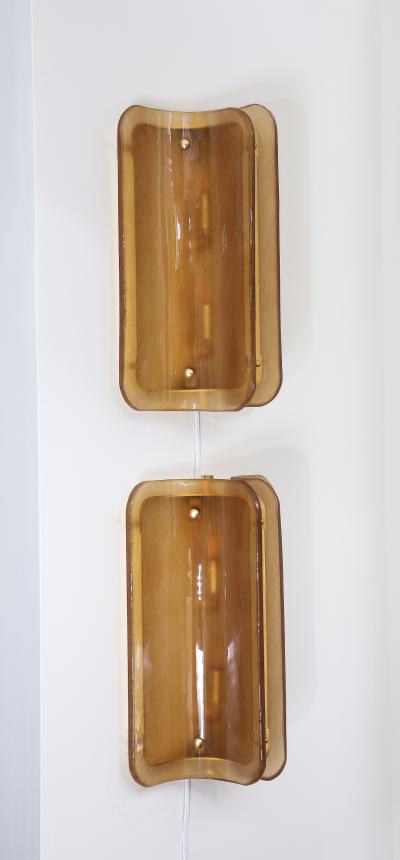 Pair of Hand casted Murano Glass and Brass Wall Sconces in Cognac Italy