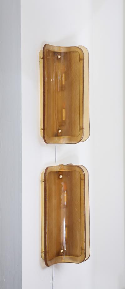 Pair of Hand casted Murano Glass and Brass Wall Sconces in Cognac Italy