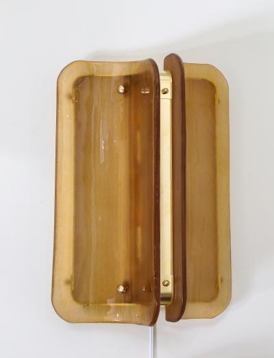Pair of Hand casted Murano Glass and Brass Wall Sconces in Cognac Italy