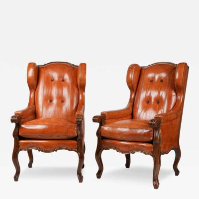 Pair of Hendrix Allardyce Italian Baroque Style Leather Wing Chairs