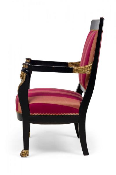 Pair of Italian Neo Classic Ebonized and Parcel Gilt Red Upholstered Armchairs